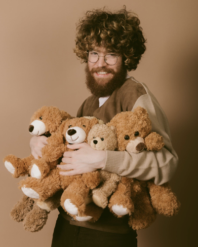 JW Francis holding 4 teddy bears