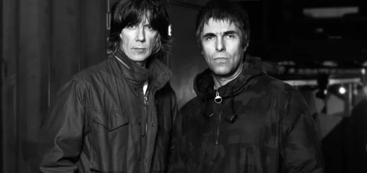Liam Gallagher and John Squire looking mean and moody in their parka jackets