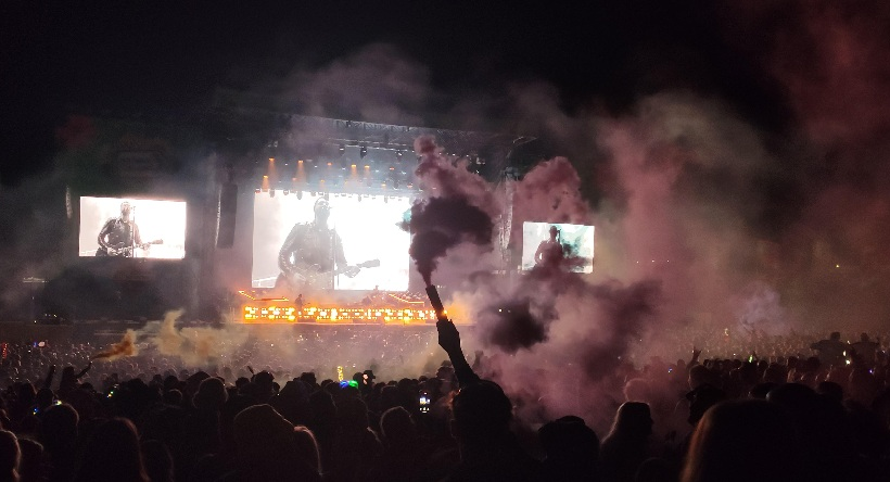 A flare being waved in the crowd during The Courteeners set at kendal calling 2025