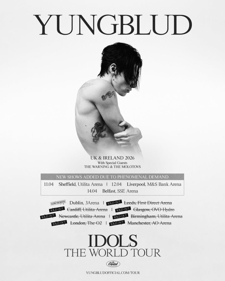 Youngblud photographed in black and white, topless and from a side profile