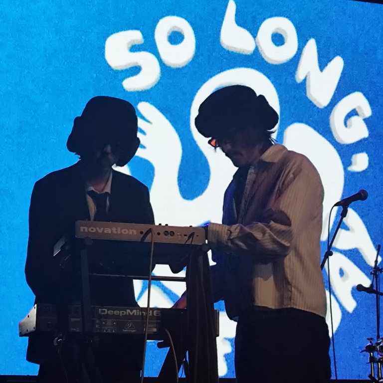 Monks on stage at so long, good friday festival